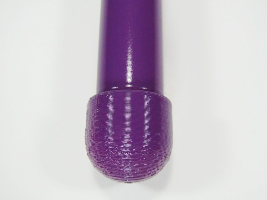 Demonstration of A Color Matched Rugged Tip On A 48 Inch Plum Purple Cane